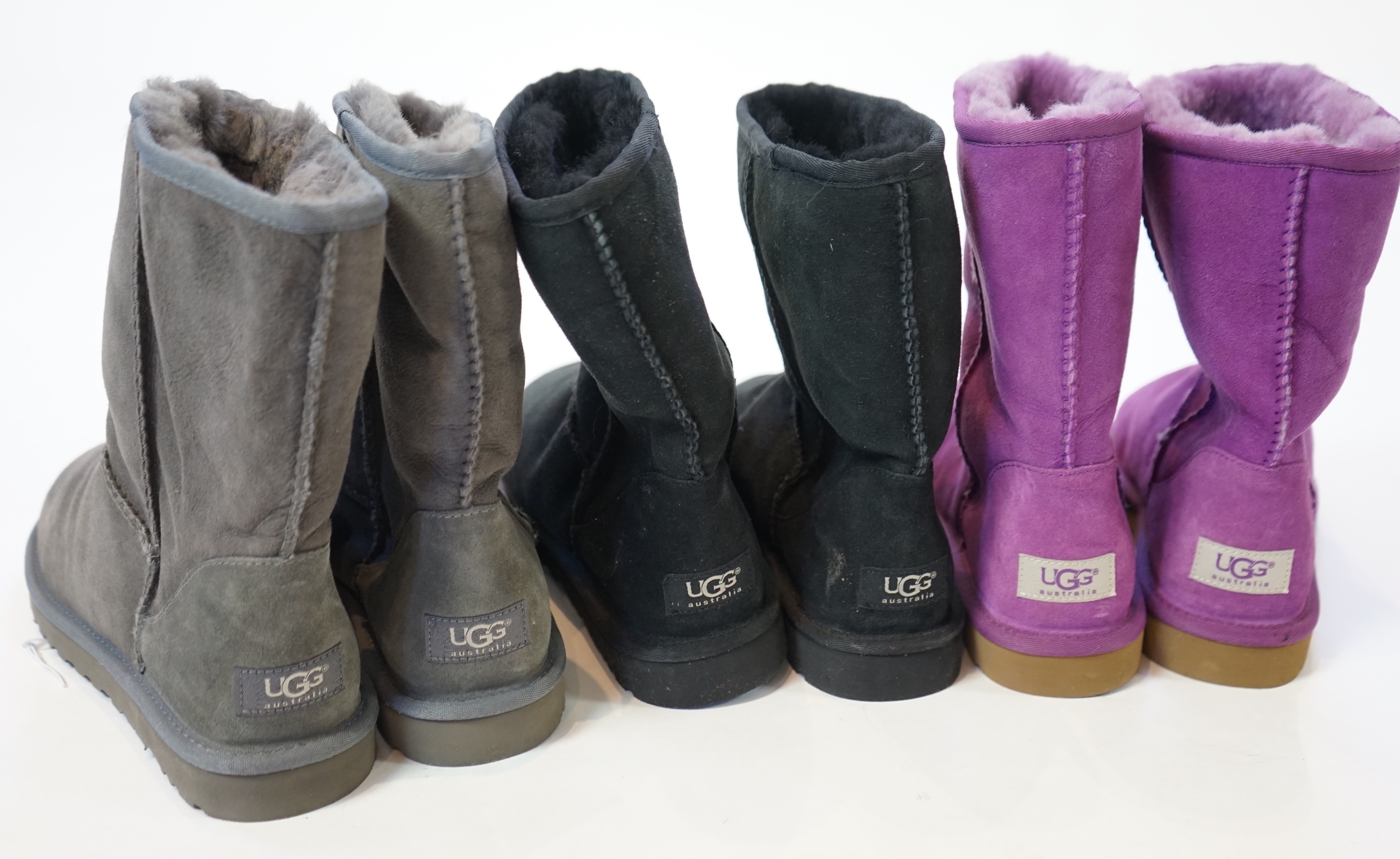 Three pairs of lady's sheepskin UGG boots, size UK 7.5